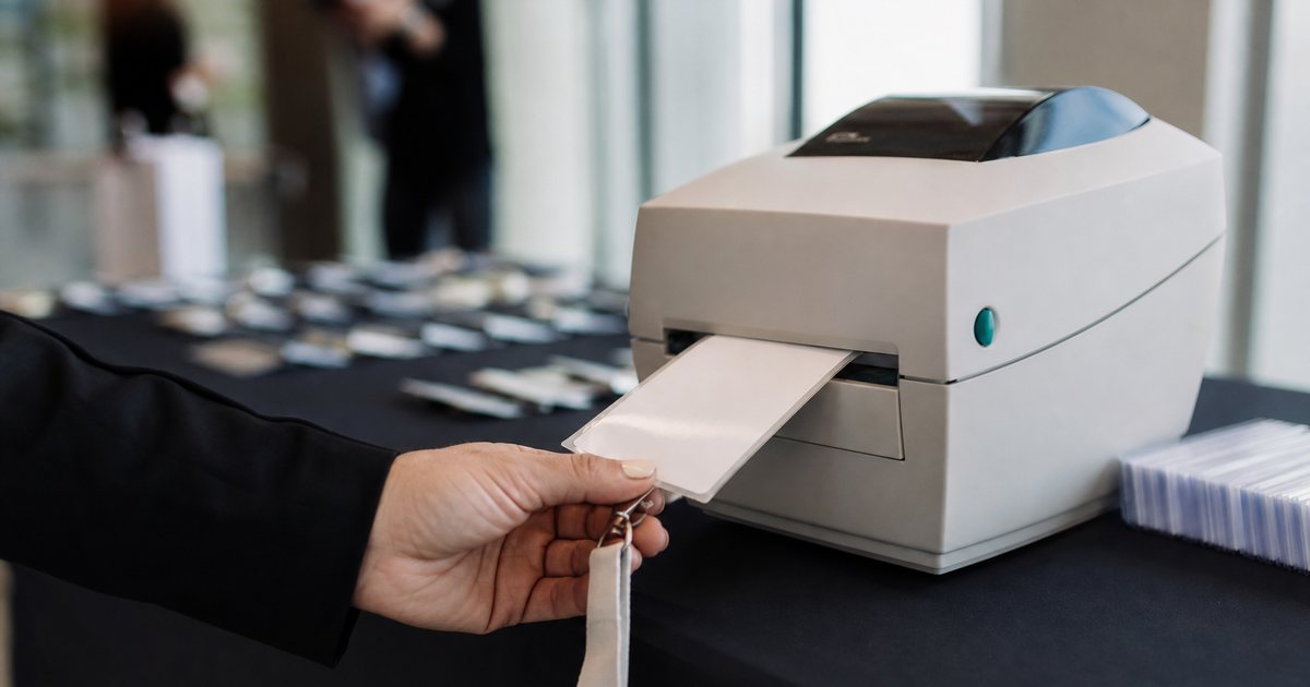 What are the benefits of printing event badges on site instead of pre printing them all in advance?